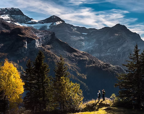 Hikers in Mountainous Landscape
